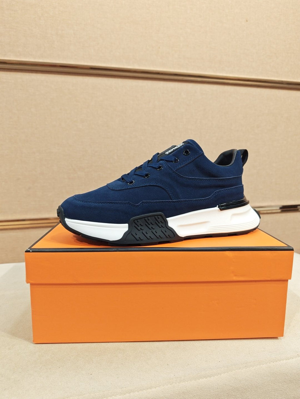 Hermès Lace-Up Sculpted-Sole Sneakers