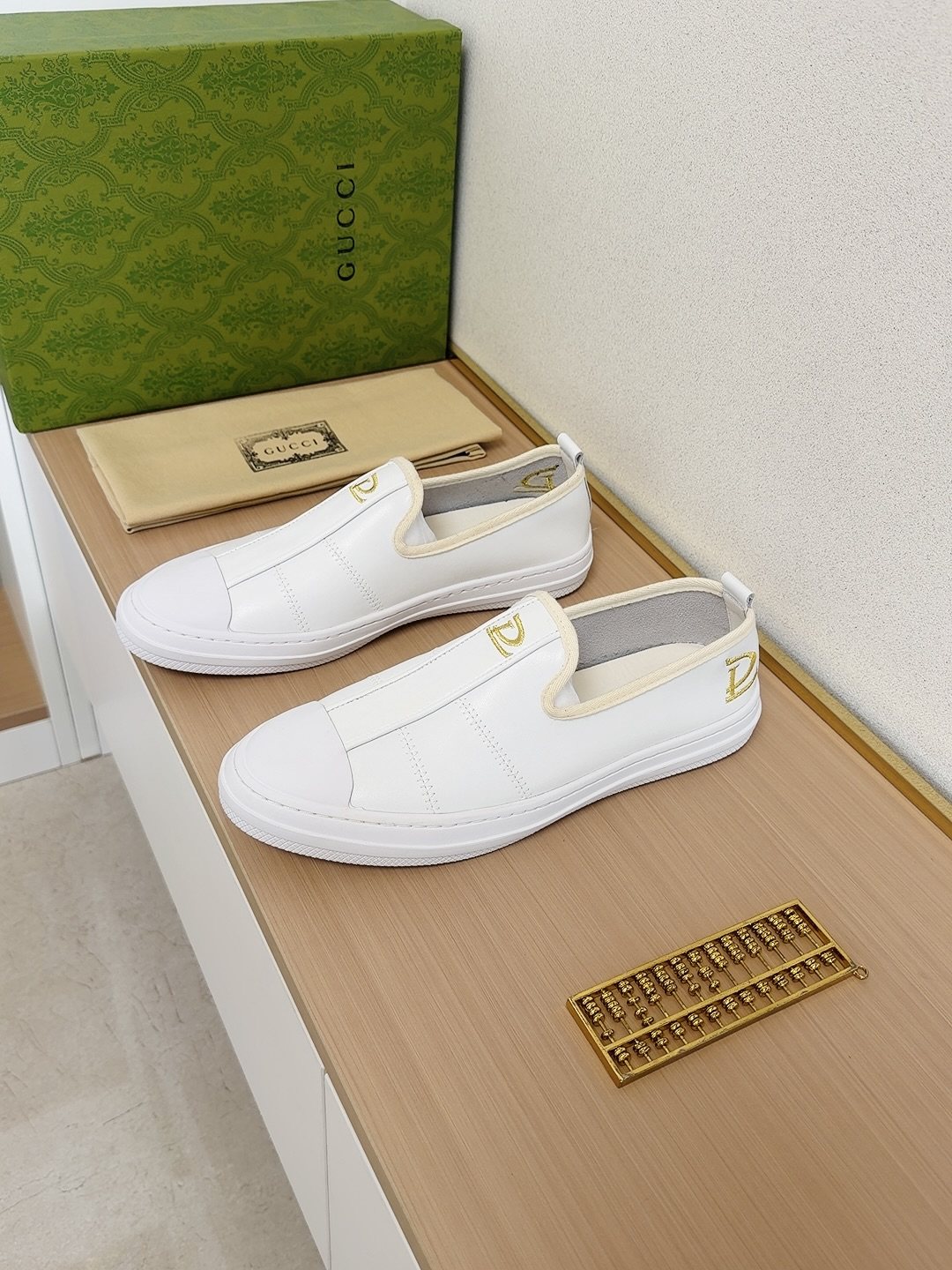 Gucci Brown Slip-On Sneakers with White Toe Caps